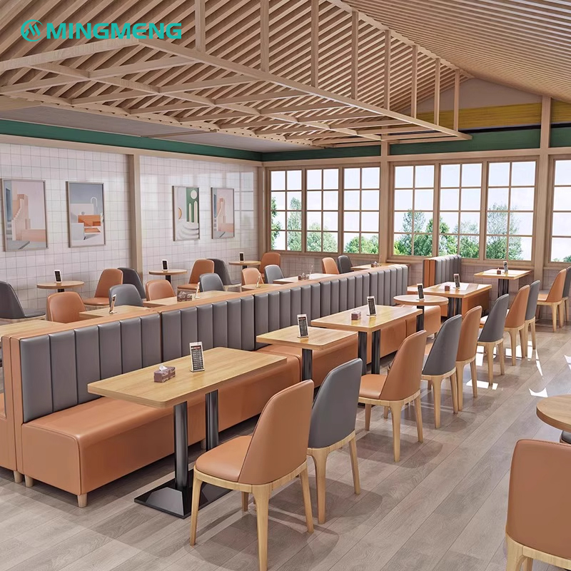 Two-Tone Dining Booth-Upholstered Bench With Back1 Multiple lines of brown and gray leather booths and chairs in restaurant