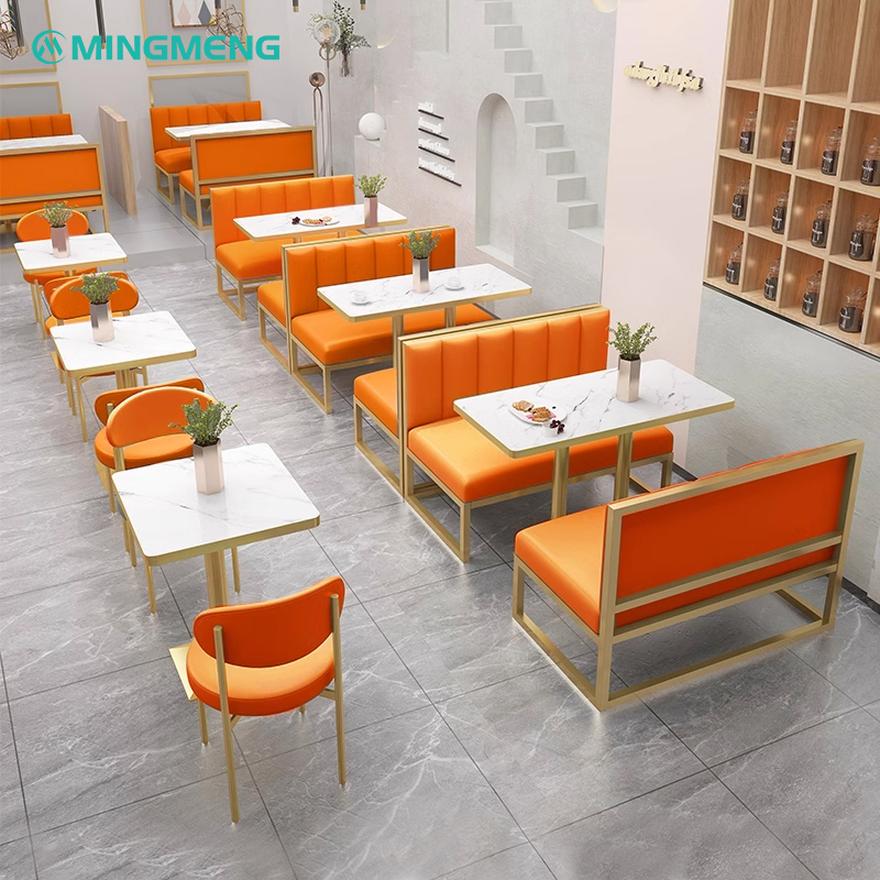 Restaurant layout featuring rows of rock slab dining tables and booths