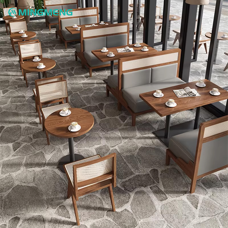 Modern cafe seating with booth and chair combos in gray leather and cane back design