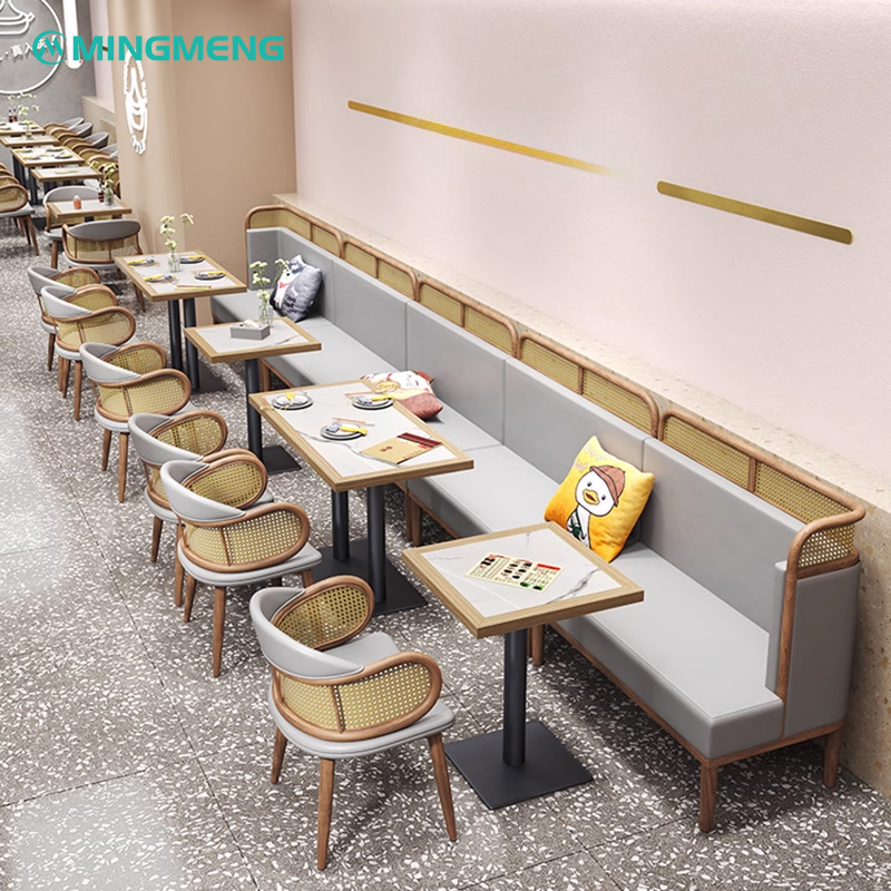 Long row of rattan backrest dining booths in stylish modern café