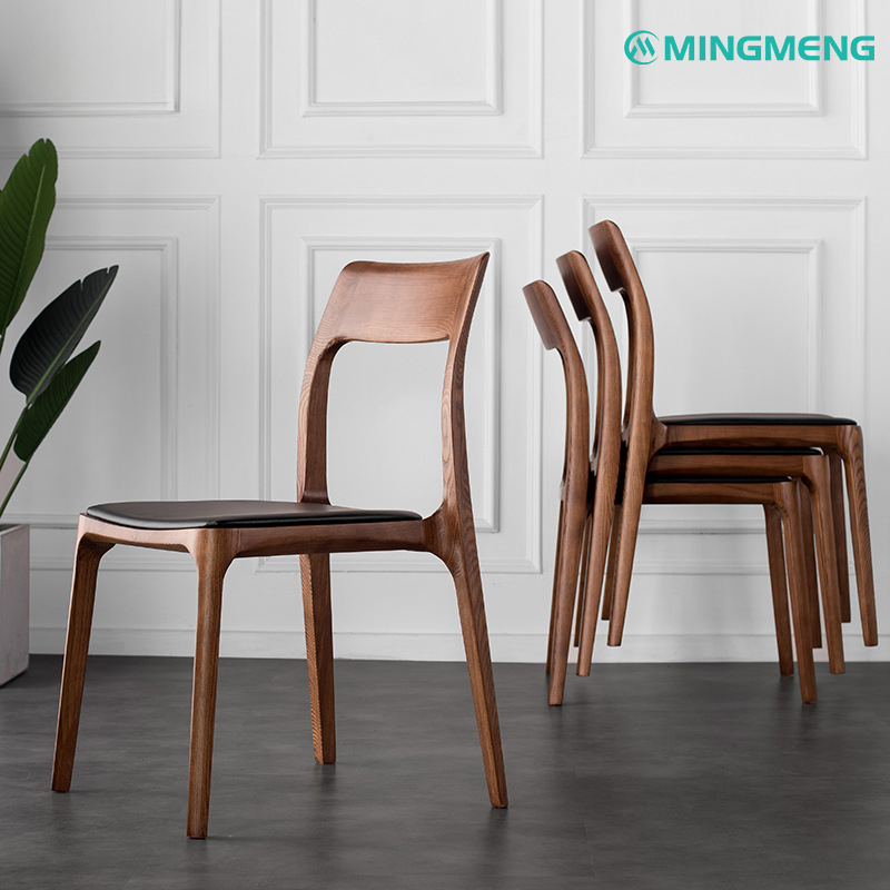 Dark walnut solid wood dining chair with black seat, minimalist style
