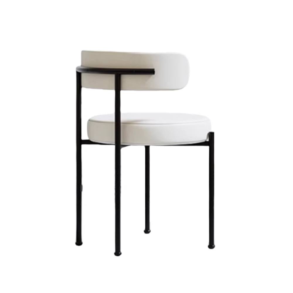 White minimalist round dining chair with leather upholstery and black metal legs