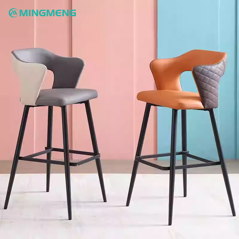 A contemporary two-tone Nordic barstool with orange and gray seats and a black metal frame.