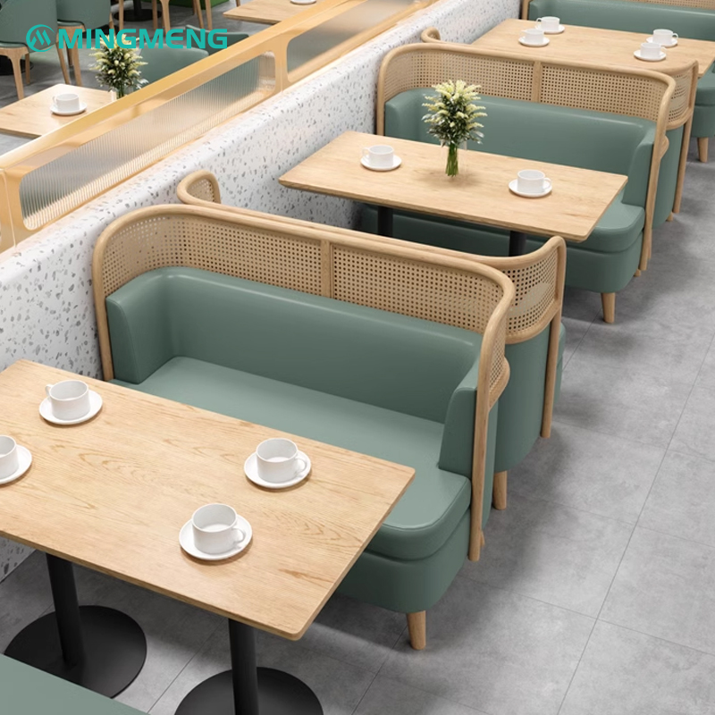 Modern restaurant booth with green cushion and wooden backrest