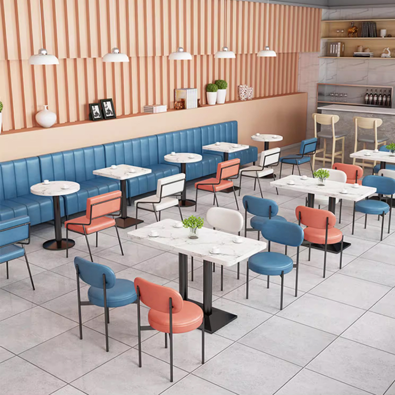 Blue Leather With Vertical Stripe Backrest Restaurant Booth Restaurant corner seating with colorful cushions, ideal for cozy dining settings