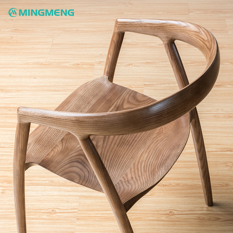 Top view of a Japanese solid wood dining chair showcasing natural grain