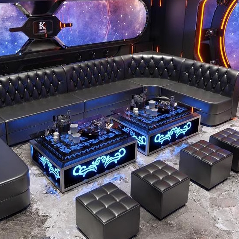 Modern LED Glass-Top KTV Table KTV table with glowing blue LED design and black leather seating in private room