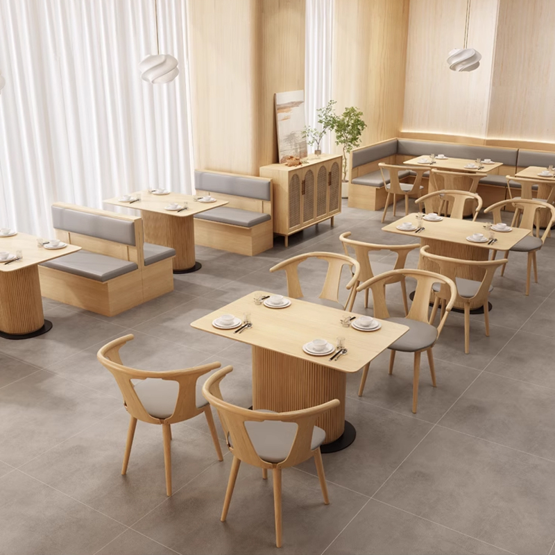 Grey Leather Cushion Minimalist Restaurant Wooden Booth1 Modern light wood restaurant booth seating with grey cushions and round wood dining tables in a contemporary dining setup