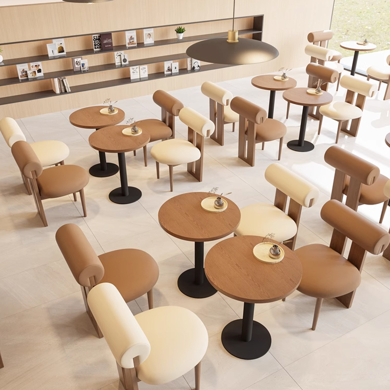 Leather Cylinder Backrest Restaurant Booth1 Modern restaurant booth with round tables and cushioned seating, perfect for cozy dining experiences