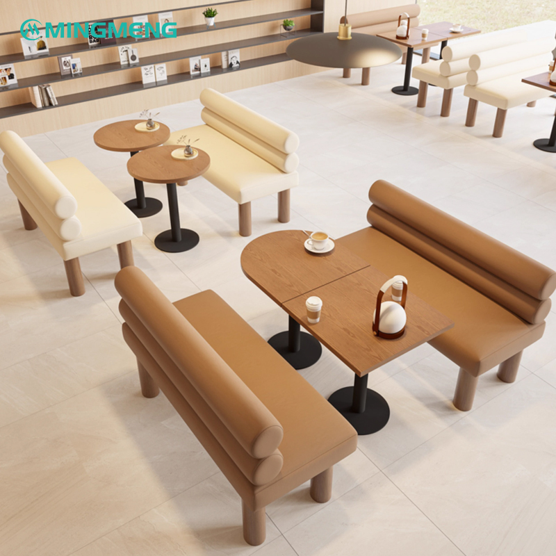Modern restaurant booth design with natural wood and neutral color scheme for a cozy dining experience.