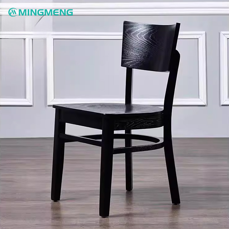 Black solid wood restaurant chair with wide curved backrest and square seat, ideal for modern dining spaces.