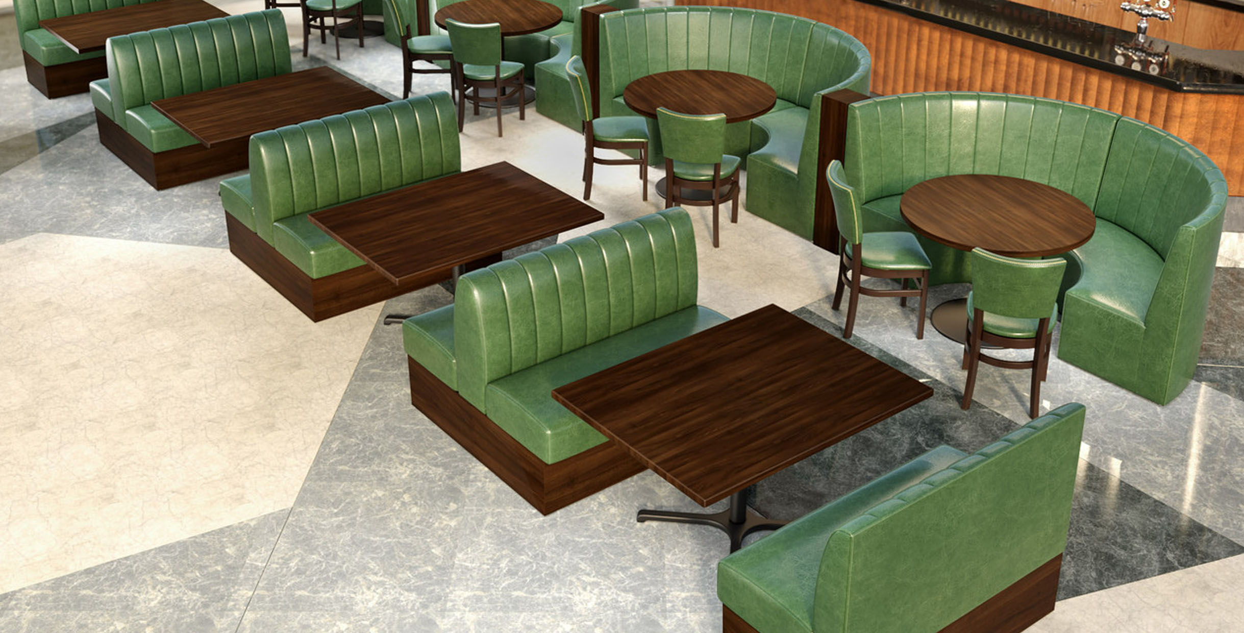 Green leather booth seating with wooden tables in a restaurant setting