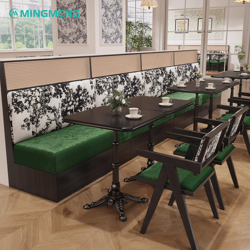 Artistic Restaurant Chair – Black Wood Frame with Green Velvet Seat & Patterned Backrest3 Custom restaurant booth seating with green cushions, floral backrest design, paired with black dining tables and wooden chairs