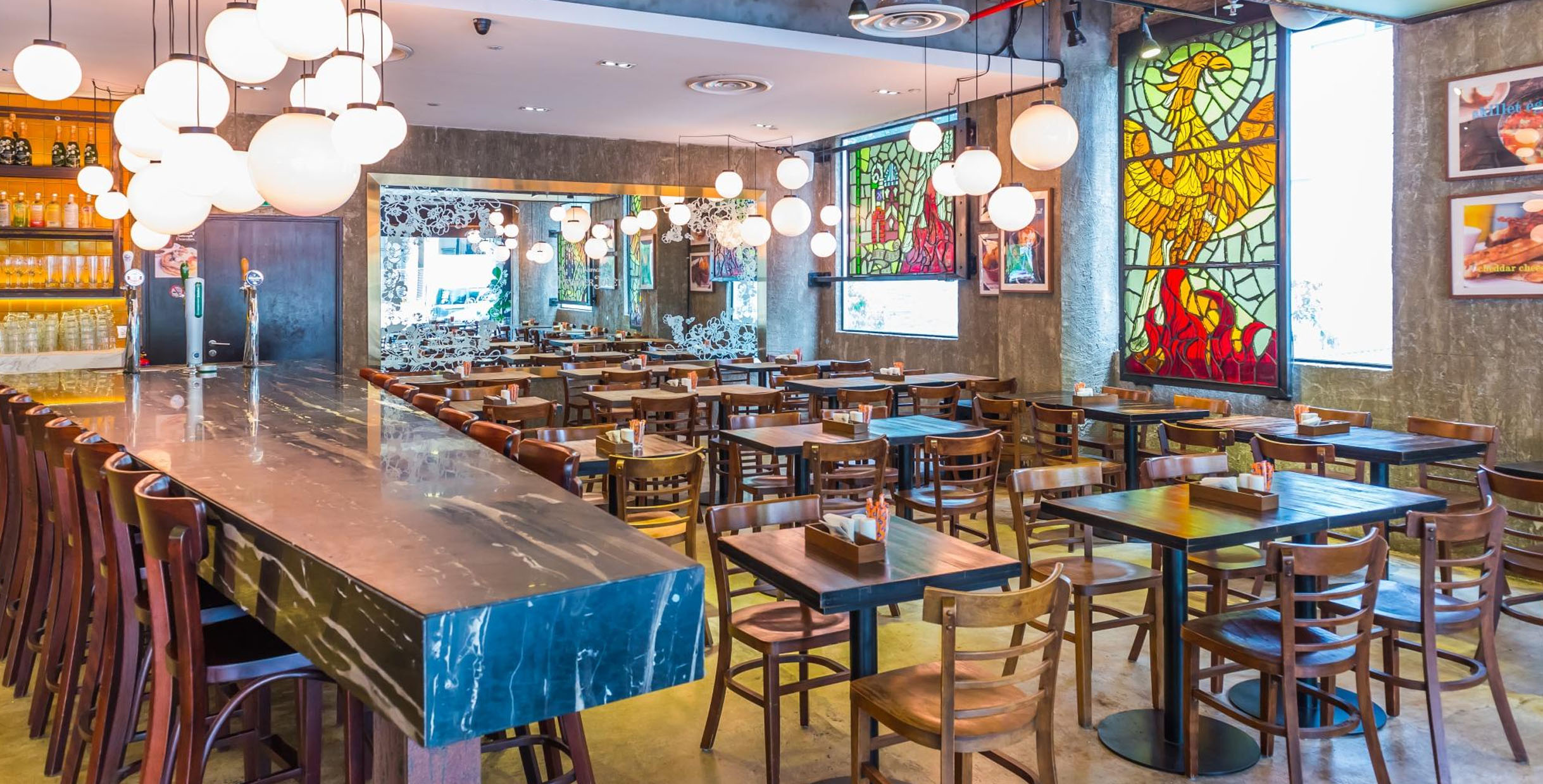 Modern cafe dining set featuring wooden tables and chairs with a cozy and stylish design.
