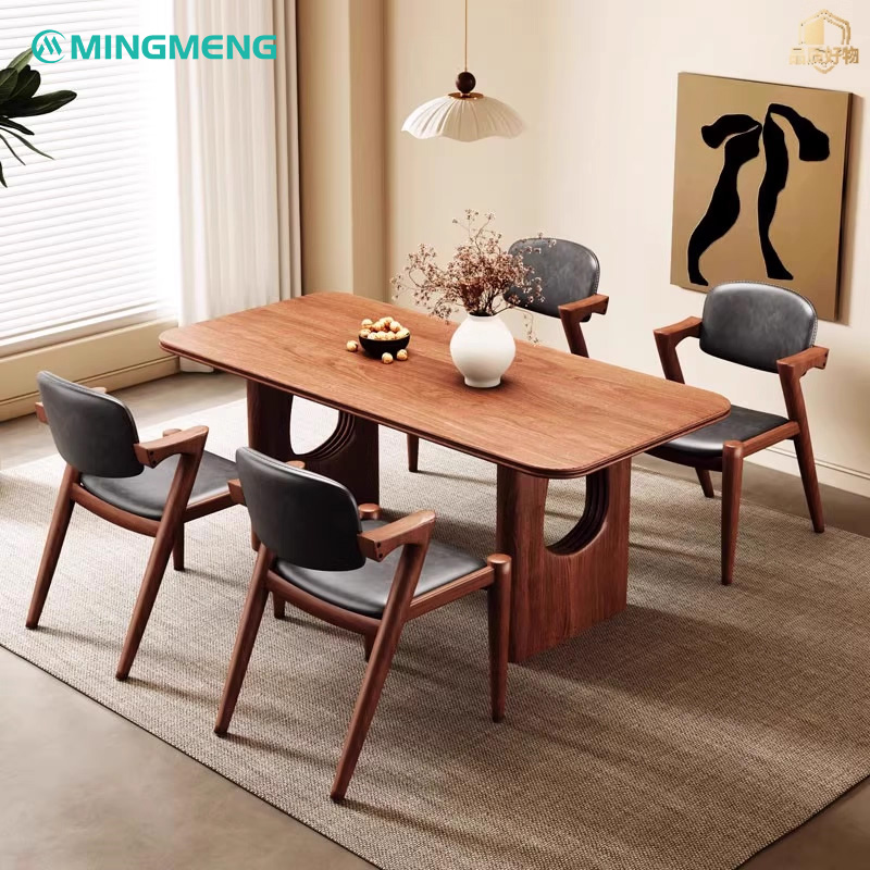 Nordic Modern Z-Shaped Dining Chair Set of four Nordic modern Z-shaped restaurant chairs with black leather seat around rectangular wood dining table in stylish dining room
