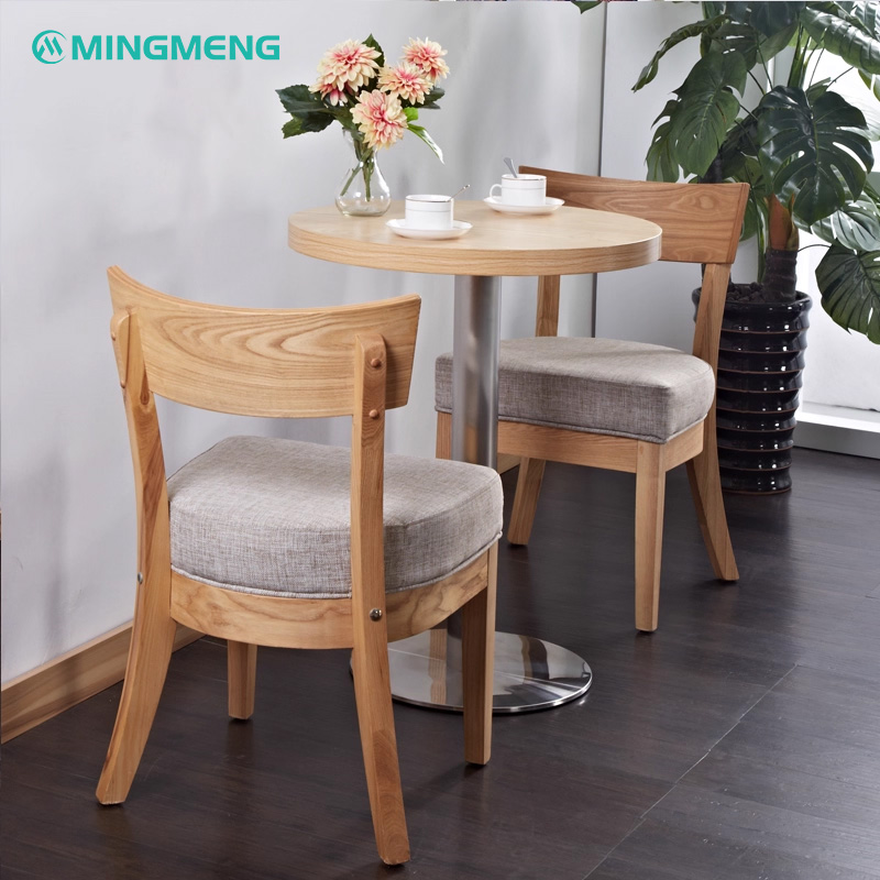 Nordic Style Dining Chair – Solid Wood Frame with Cotton Nordic style wooden restaurant chairs with grey linen seat cushions around a round dining table