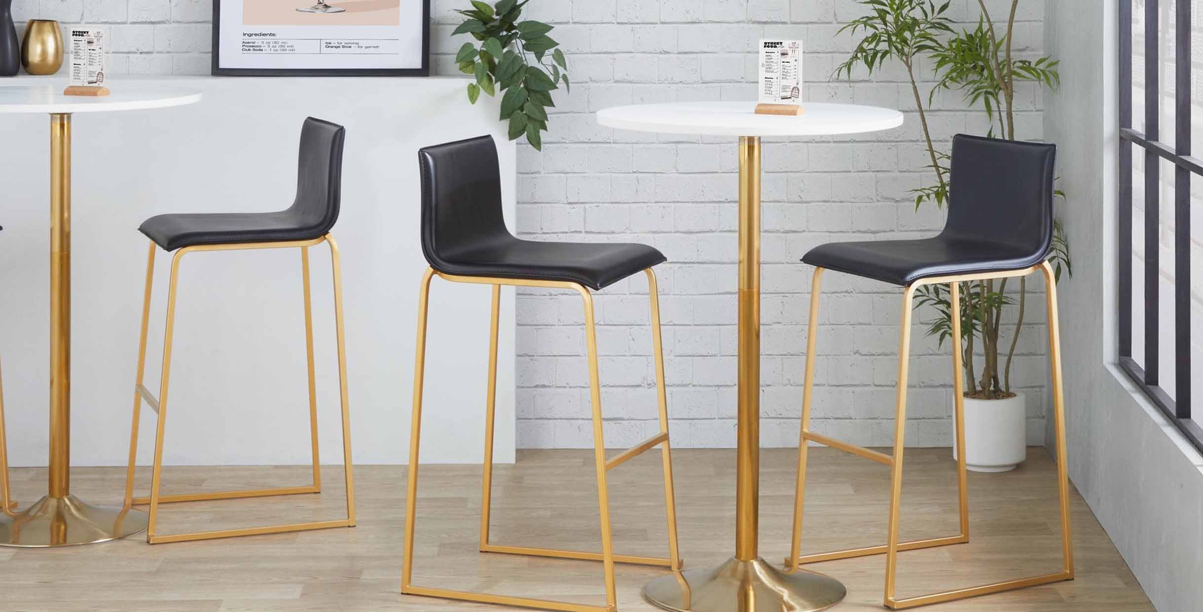 Modern black leather bar chairs with gold metal frames and white high tables by MINGMENG
