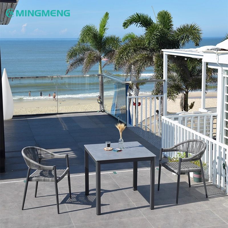 MINGMENG modern Yadu outdoor rattan chair set with square patio table overlooking the beach