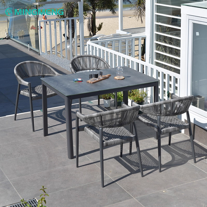Modern Yadu Outdoor Patio Rattan Chair2 Modern Yadu outdoor rattan dining table and chair set with handwoven rope seats by MINGMENG on a coastal patio