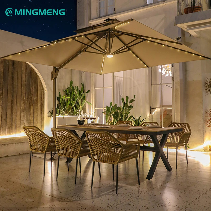MIER Outdoor Rattan Armchair1 Mingmeng rattan outdoor dining set with LED patio umbrella and aluminum table at night
