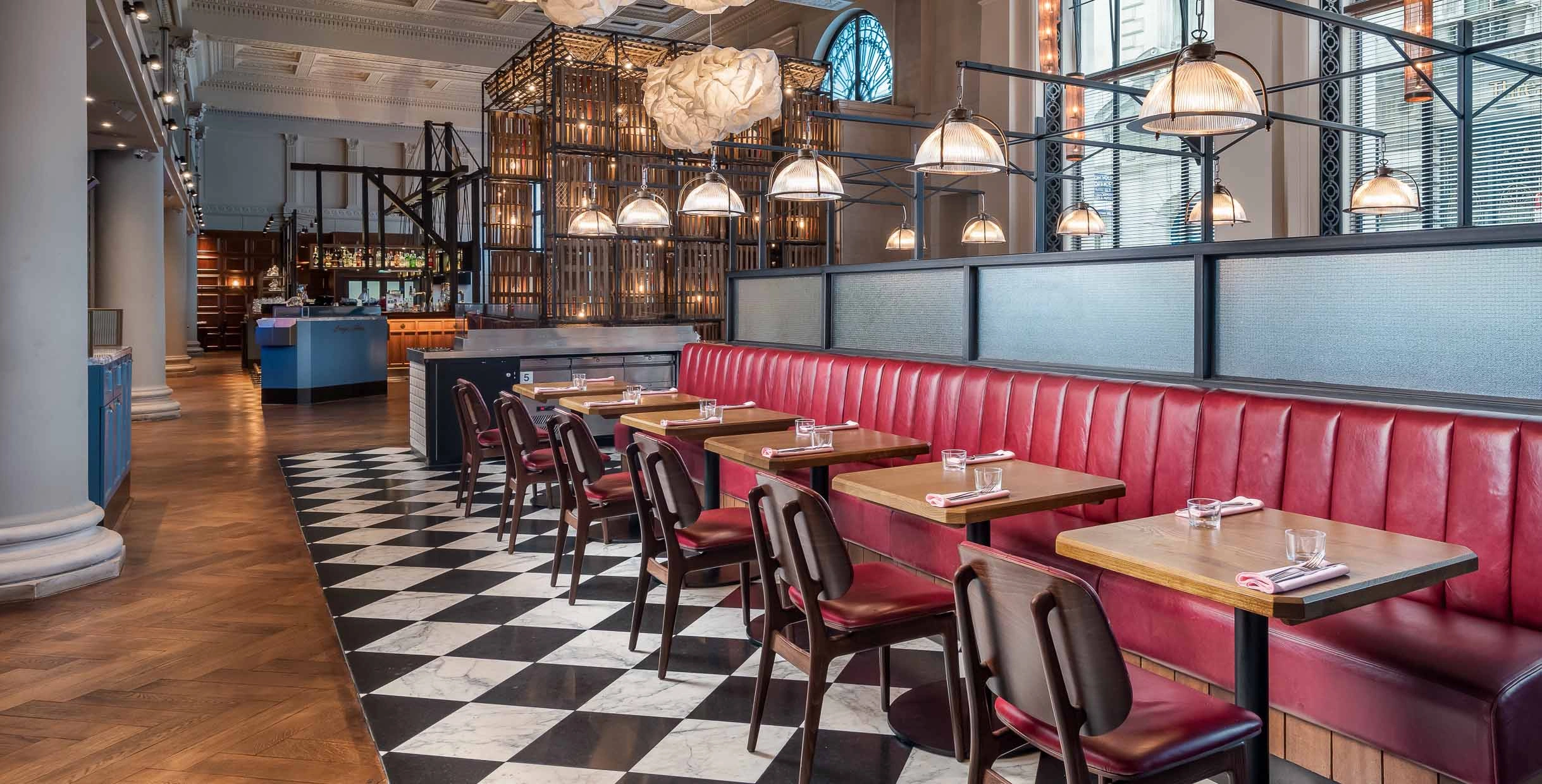 Mingmeng restaurant furniture sets with red booth seating, wooden tables, and matching dining chairs in modern interior