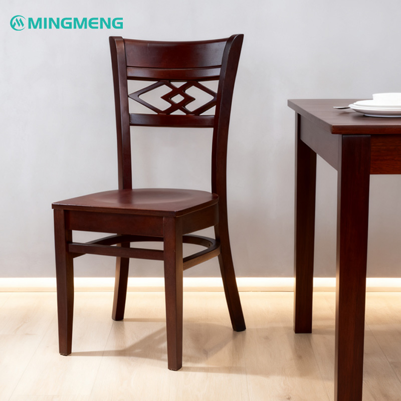 Vintage Solid Wood Coffee Chair – Dark Walnut Finish with Carved Backrest1 Mingmeng vintage wooden restaurant chair in dark brown with carved backrest and solid wood frame, ideal for classic dining spaces and cafés.