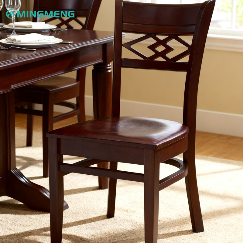 Vintage Solid Wood Coffee Chair – Dark Walnut Finish with Carved Backrest3 Mingmeng vintage wooden restaurant chair in dark brown finish, paired with matching dining table in café interior setting