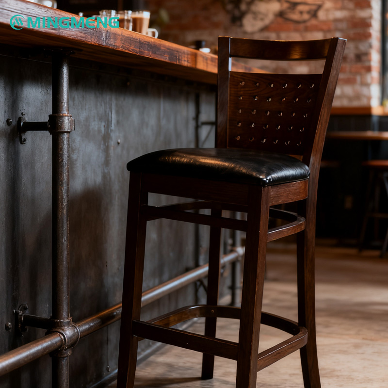 Custom Solid Wood Bar Stool – High Back Design with Perforated Backres1 Mingmeng wooden bar stool with perforated backrest and black leather seat in modern restaurant bar setting