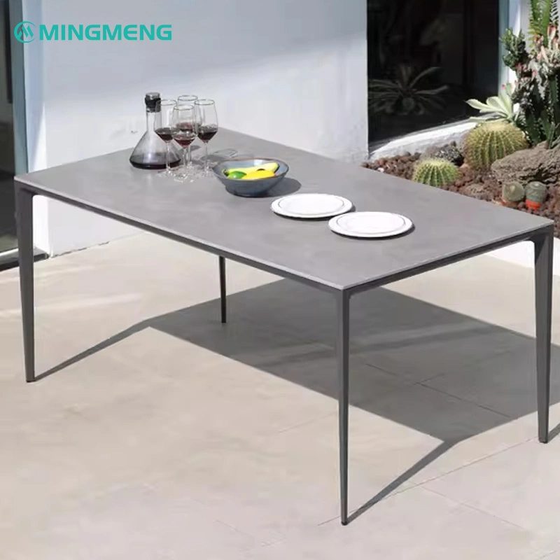 Outdoor Garden Dining Table With Sintered Stone Top Minimalist gray ceramic outdoor dining table with sleek metal frame, perfect for restaurant patios, cafes, and garden dining areas.