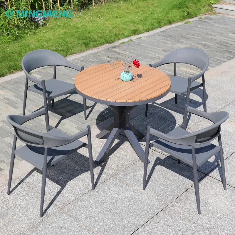 WPC Slatted Top with Aluminum X-Base Outdoor Table3 Outdoor dining table set with a round wooden top and comfortable mesh chairs, perfect for outdoor spaces.