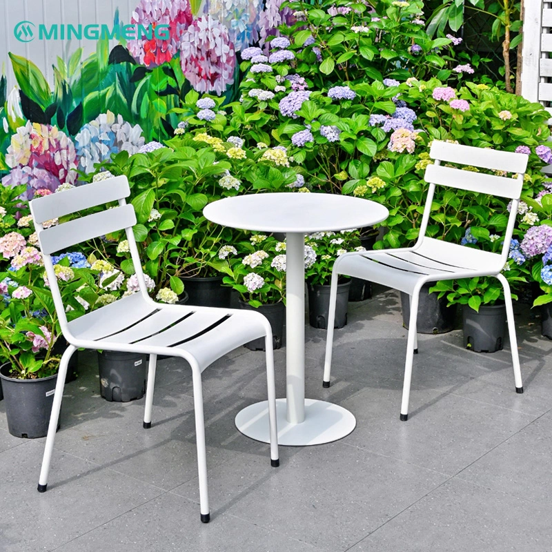 Custom White Outdoor Garden Dining Table1 White metal round outdoor table and chairs set surrounded by hydrangeas