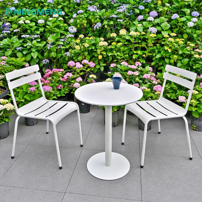 Custom White Outdoor Garden Dining Table White outdoor dining table and chairs set in garden with hydrangeas background