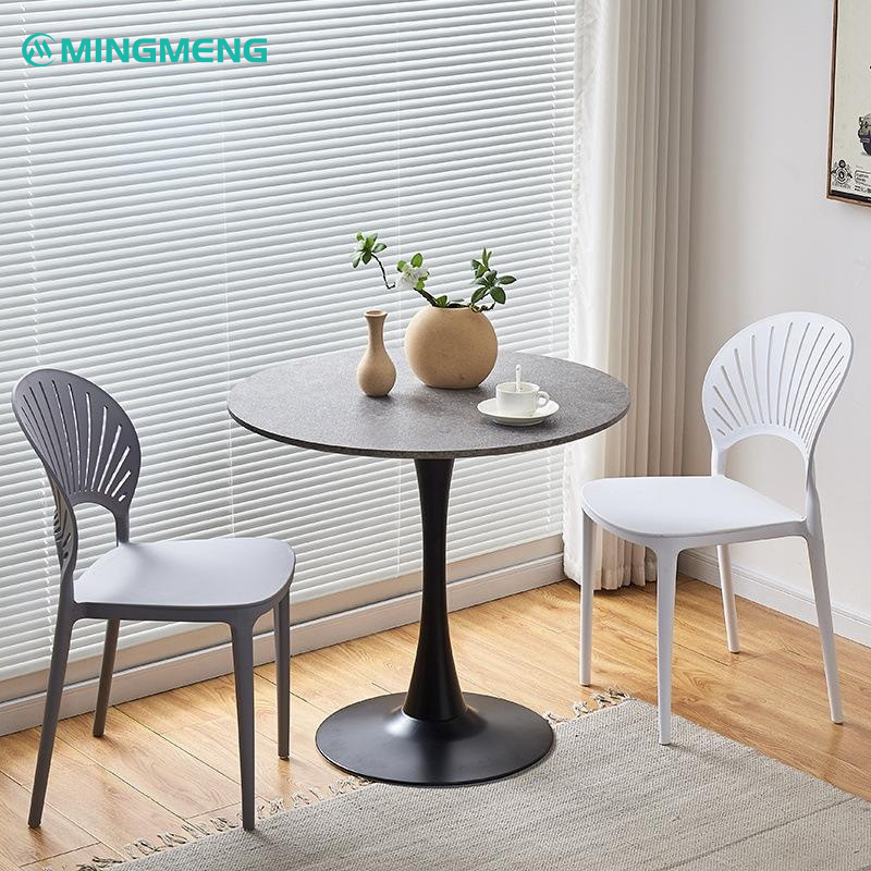 Modern Conical Table Base: Where Minimalist Design Meets Unshakable Strength2 Black conical restaurant table base with round stone top and minimalist chairs